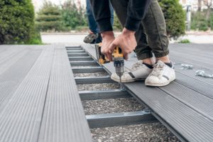 Salem Steel Deck Framing worker with a power drill